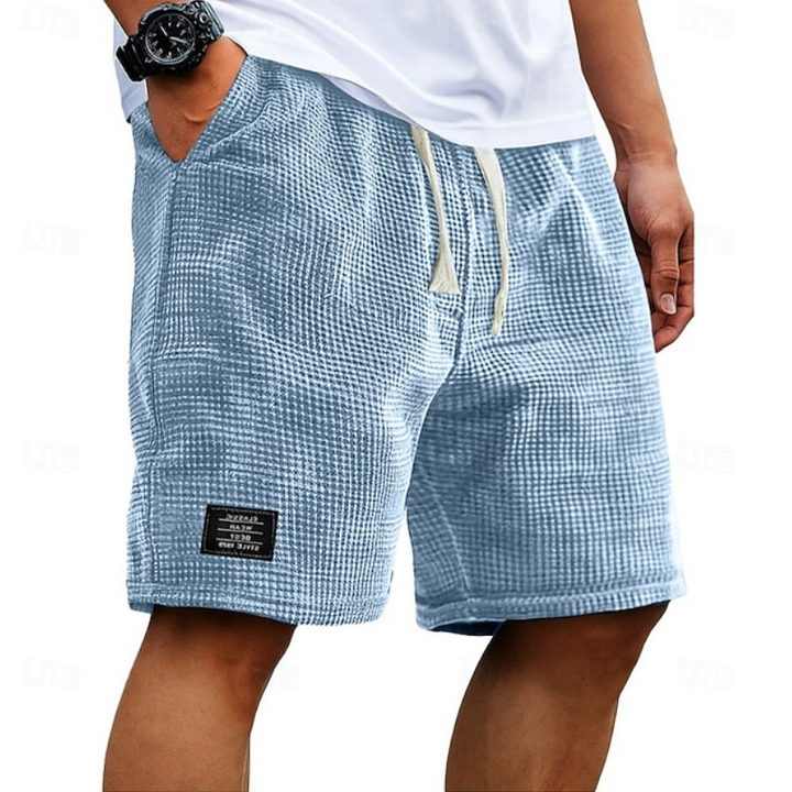Mænd Elegante Shorts med Tekstureret Mønster og Mærkedetalje
