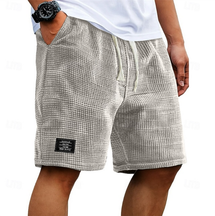 Mænd Elegante Shorts med Tekstureret Mønster og Mærkedetalje