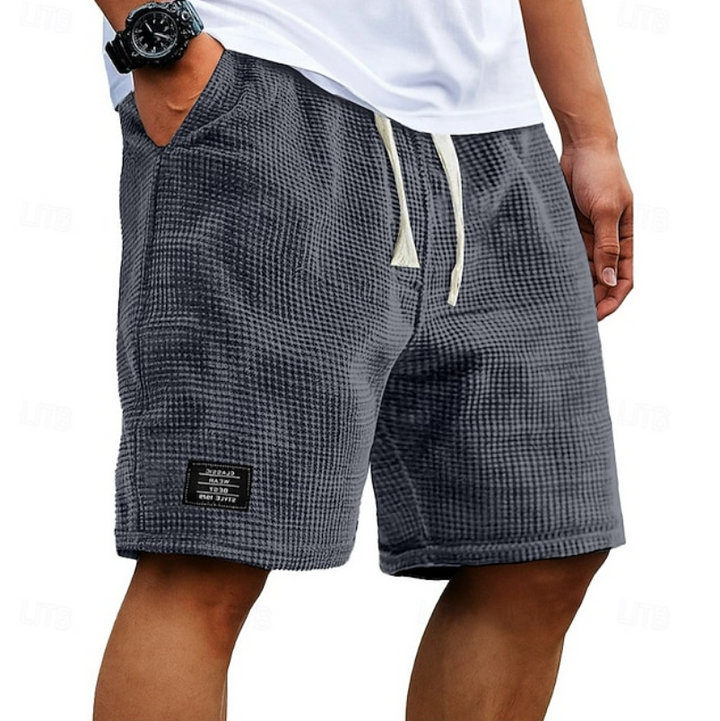 Mænd Elegante Shorts med Tekstureret Mønster og Mærkedetalje