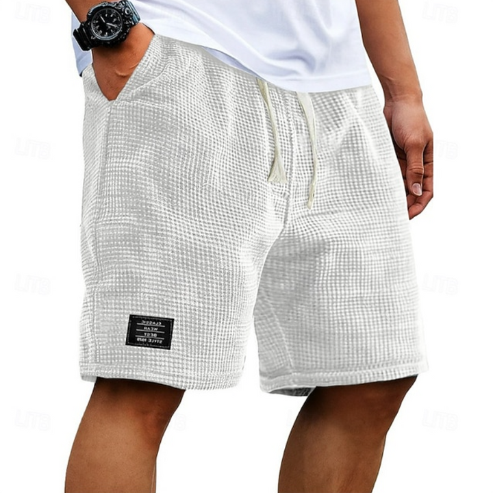 Mænd Elegante Shorts med Tekstureret Mønster og Mærkedetalje